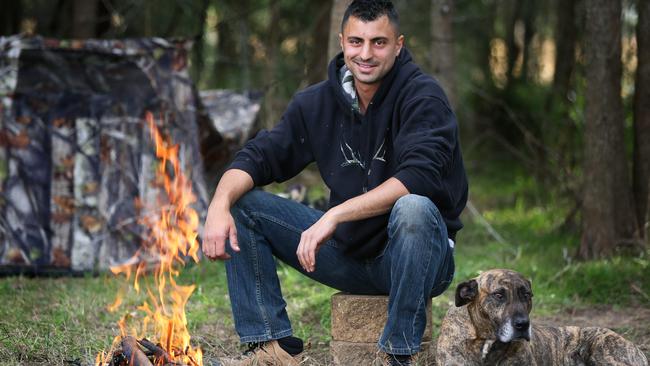 Billy Volonakis with his dog Ned will try and live off the land for three days next month to raise money for people living with Sanfilippo. Picture: Angelo Velardo