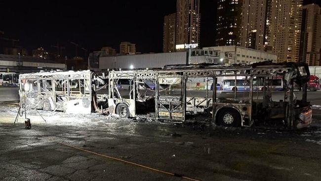 Israeli police inspect the scene of one of a series of bus explosions in what authorities said appeared to be a militant attack in Bat Yam, central Israel, Thursday, Feb. 20, 2025 - Israel Fire and Rescue Authority