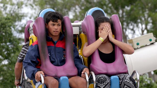 James Dawson and Raphila Carpinter on the XXXL ride at the Cairns Show PICTURE: ANNA ROGERS