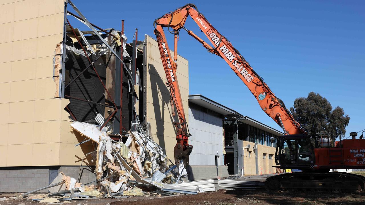 An excavator begins the demolition of Port Adelaide’s Alberton Oval’s training headquarters. Picture: Emma Brasier