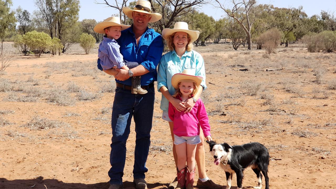 Hugh and Tannas Godfrey with their kids Arly, 5 and Rex, 2, with dog Rio on Barrygowanstation, 150km southeast of Cunnamulla. September, 2018.