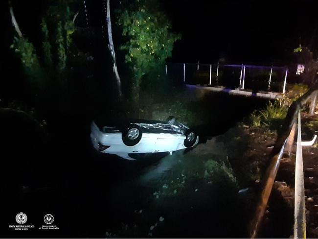 The car left the road and flipped into Aldgate Creek, but the woman walked away with only minor injuries. Picture: SA Police