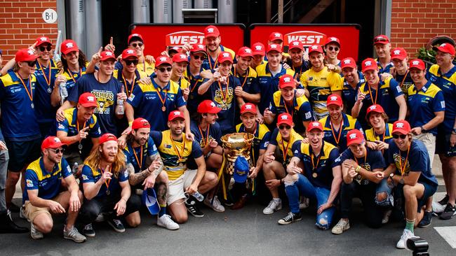 SANFL premier Woodville-West Torrens' colours are unveiled on the chimney at the West End Brewery. Picture Matt Turner.