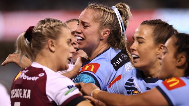 CANBERRA, AUSTRALIA - JUNE 24: Kezie Apps of the Blues reacts after scuffling with Tazmin Gray of the Maroons during the Women's State of Origin match between New South Wales and Queensland at GIO Stadium on June 24, 2022 in Canberra, Australia. (Photo by Cameron Spencer/Getty Images)