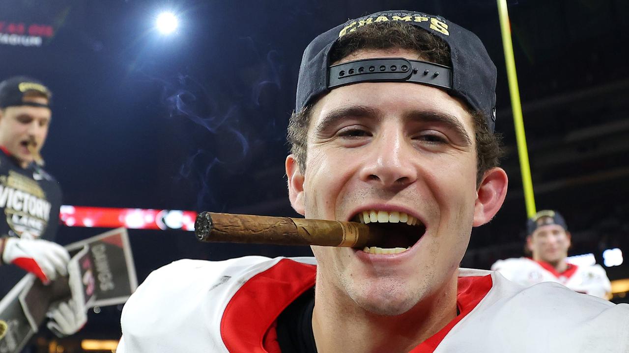 Stetson Bennett of the Georgia Bulldogs celebrates after his team defeated the Alabama Crimson Tide 33-18 in the 2022 CFP National Championship Game. Picture: Kevin C. Cox