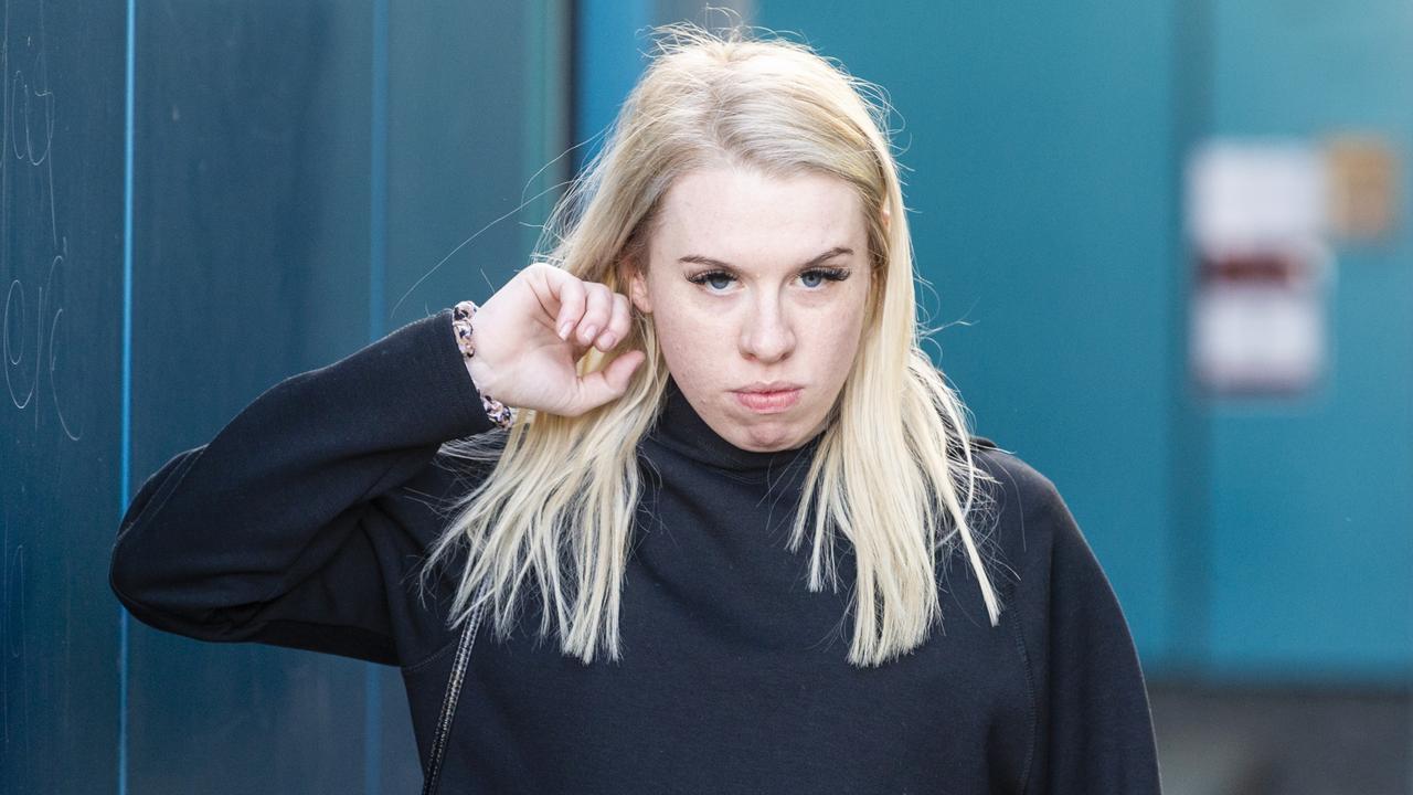 Isobel Rose Higgins, 24, leaves the Toowoomba Watch House after being charged with being an accessory after the fact of murder of Thor Morgan, Thursday, August 18, 2022.