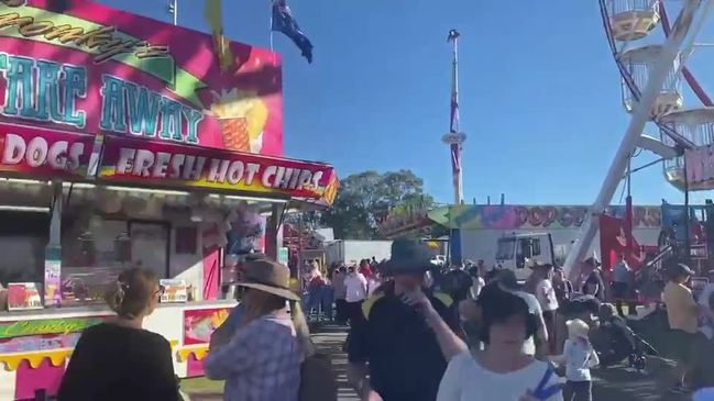 Punters gather at Gympie Show's Sideshow Alley