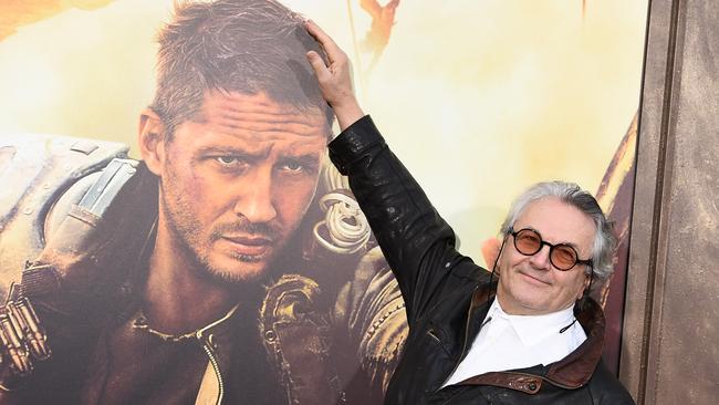 Nominated ... George Miller with a poster of Tom Hardy from Mad Max: Fury Road. Picture: AP