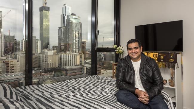 Comedian Dilruk Jayasinha in his inner-city Melbourne apartment. Pictures: Chris Groenhout