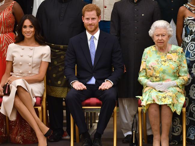 The Duke and Duchess of Sussex, Prince Harry and Meghan Markle, attend an engagement with the Queen in 2018. Picture: John Stillwell/WPA Pool/Getty Images