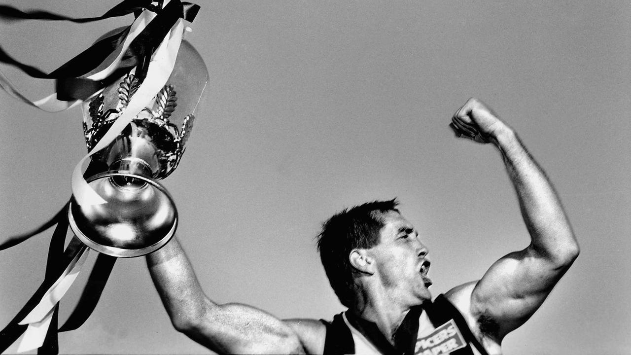 06/10/1990 PIRATE: Tony Shaw with the premiership cup. 1990 Grand Final. Collingwood v Essendon. MCG.