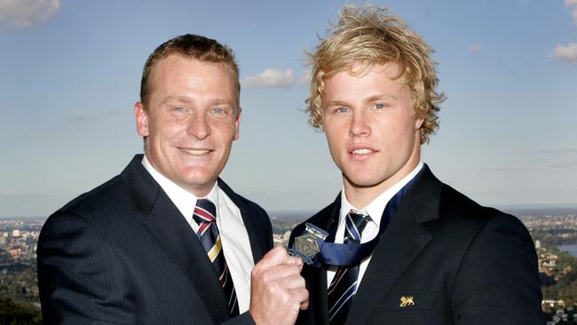 Michael Voss with Daniel Rich after the rookie won the Rising Star Award in 2009.