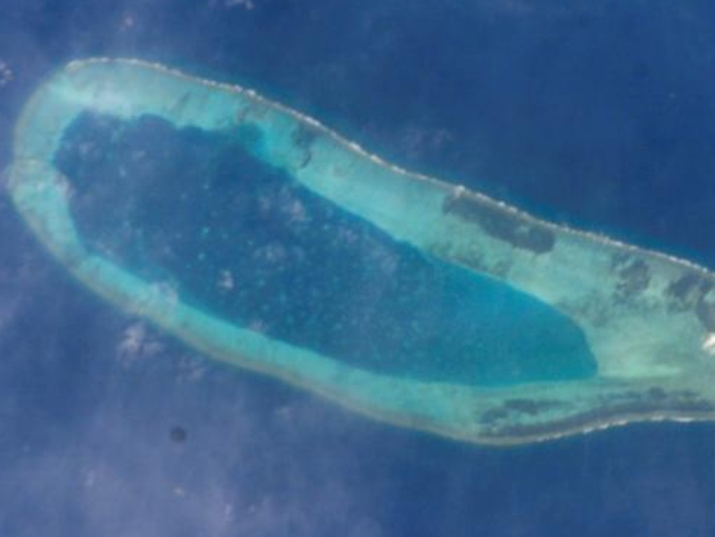 A photograph taken from the International Space Station appears to show China building on a disputed reef in the Paracel Islands. Picture: NASA