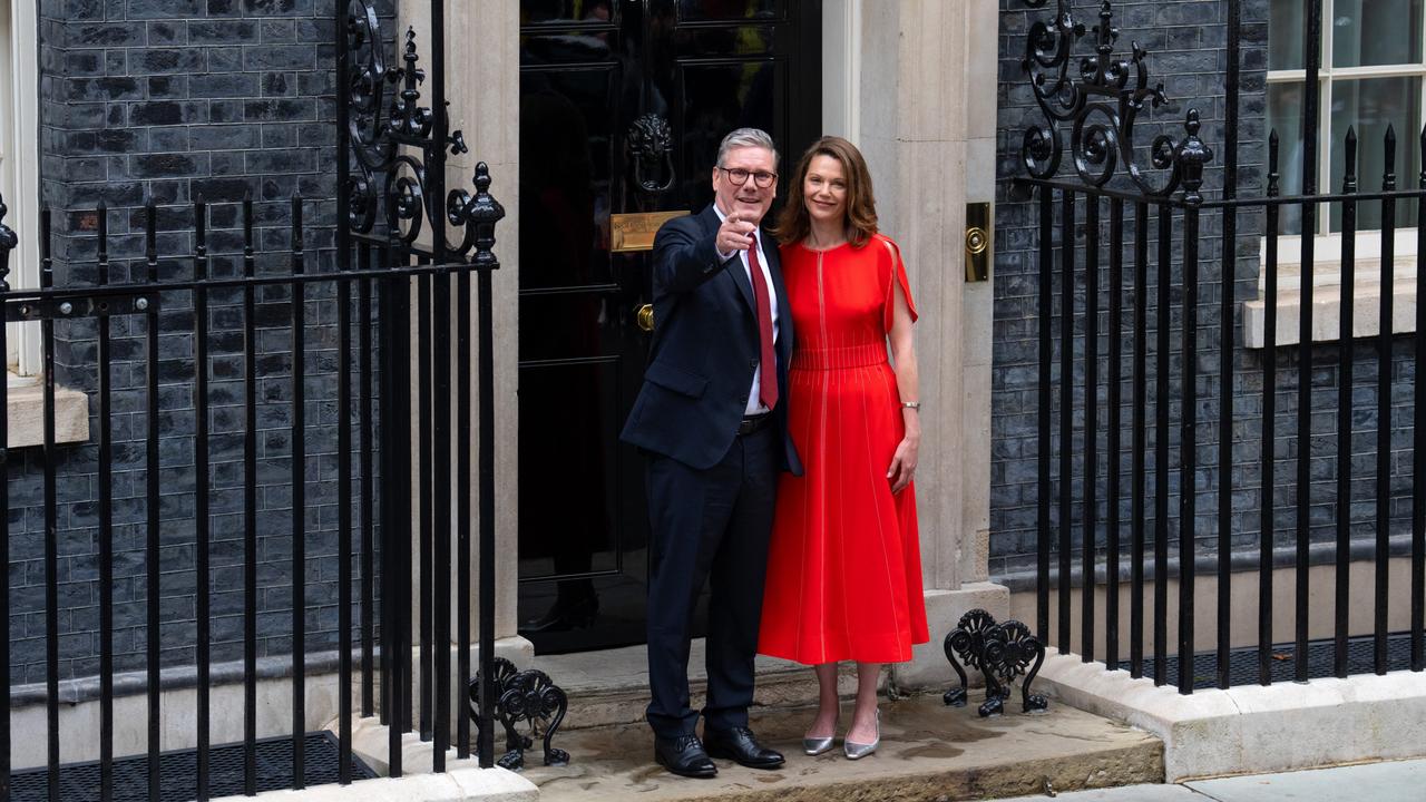 Prime Minister Sir Keir Starmer and wife Victoria, Lady Starmer enter 10 Downing Street. (Photo by Carl Court/Getty Images)