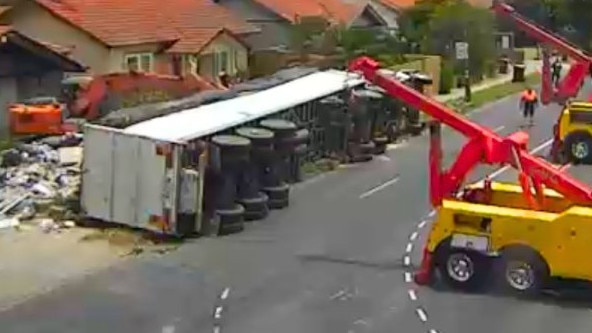 All westbound lanes of Bell St in Pascoe Vale South have been closed between Reynolds Pde and the Tullamarine Fwy after a truck rollover at the Cumberland Rd intersection. Picture: VicTraffic/X.