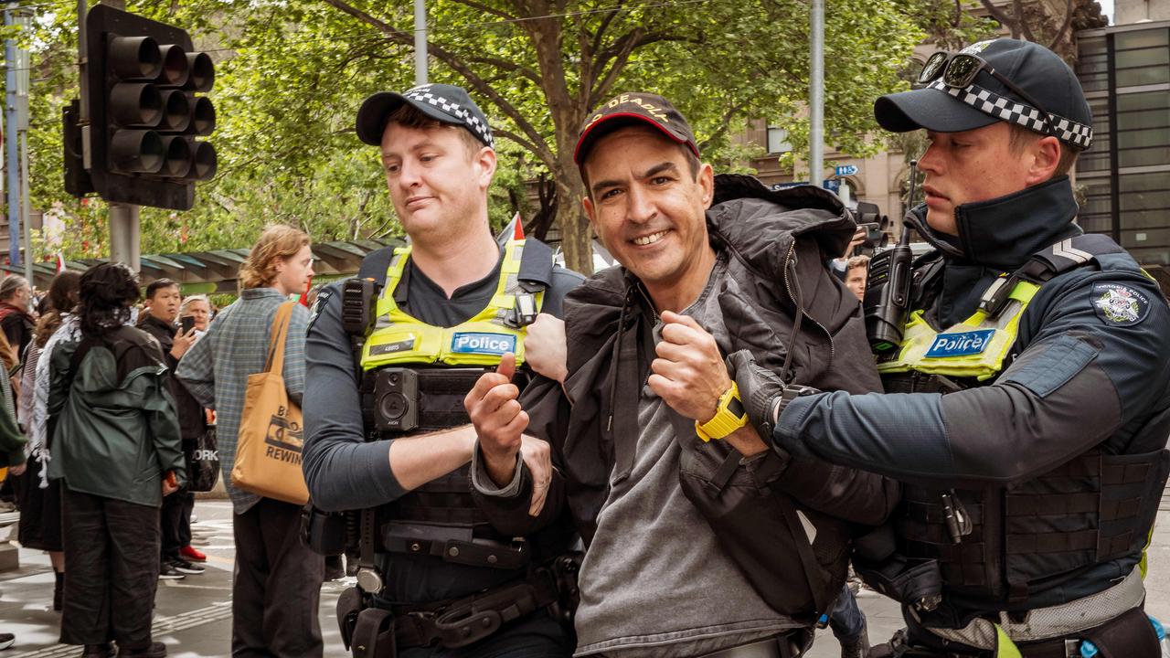 Police detain a belligerent during the Pro-Palestine rally in Melbourne. Picture: NewsWire / Tamati Smith.