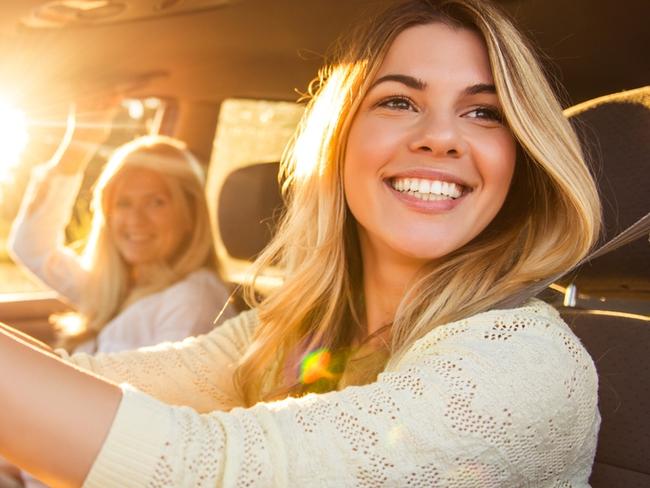 Daughter and mother going on a family vacation.  istock image