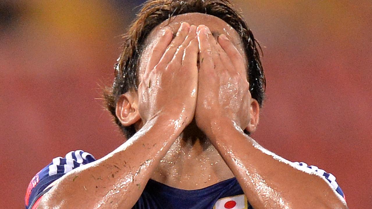 BRISBANE, AUSTRALIA - JANUARY 16: Hiroshi Kiyotake of Japan reacts after his shot at goal is unsuccessful during the 2015 Asian Cup match between Iraq and Japan at Suncorp Stadium on January 16, 2015 in Brisbane, Australia. (Photo by Bradley Kanaris/Getty Images)