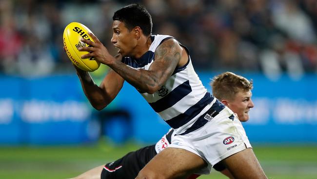 Tim Kelly evades St Kilda’s Jack Lonie last week. Picture: Getty Images