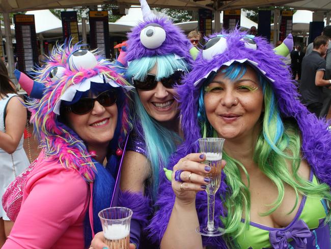 Race goers enjoy the day at Melbourne Cup Day at Flemington Racecourse in Melbourne, Tuesday, Nov. 3, 2015. Picture: AAP Image/David Crosling