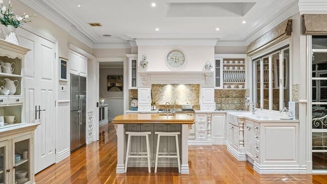 Inside the kitchen and family domain, which is adjacent to a theatre room.