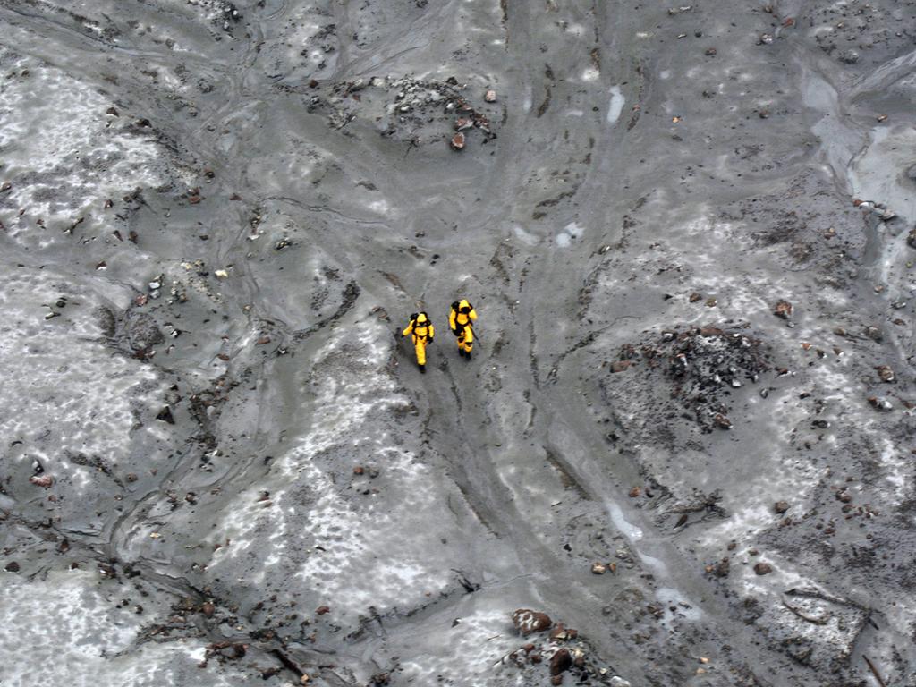 A recovery operation to the island saw six bodies brought back to the mainland, with two still missing. Picture: New Zealand Defence Force/Getty Images