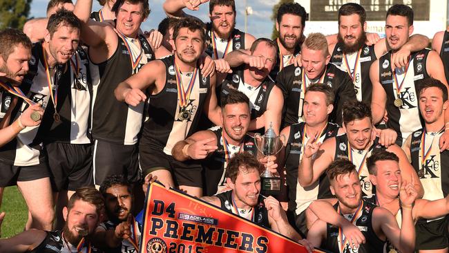 Kilburn players celebrate after winning the 2015 division four premiership. Picture: Roger Wyman