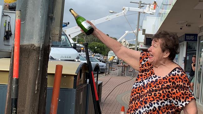 Ruth Modin celebrates the removal of “ugly” and potentially dangerous power poles from the main street of Rainbow Beach.