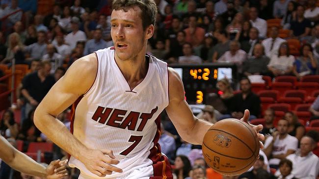 Goran Dragic #7 of the Miami Heat brings the ball up court.