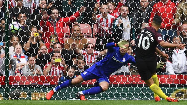 Sergio Aguero sends the keeper the wrong way from the penalty spot.