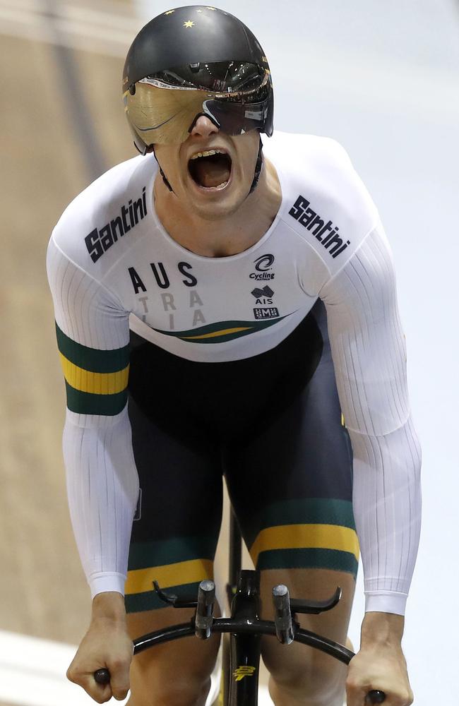 Glaetzer shows the strain of becoming the first man to go under one minute over 1km at sea level. Picture: Martin Rickett (AP).