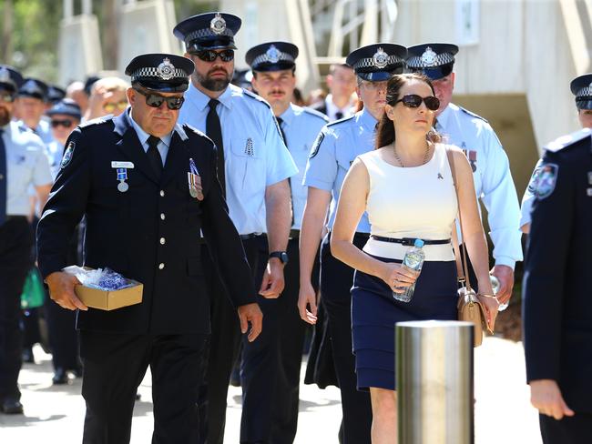 Mourners at the memorial service with full police honours for constables Rachel McCrow and Matthew Arnold at Brisbane Entertainment Centre. Picture: David Clark