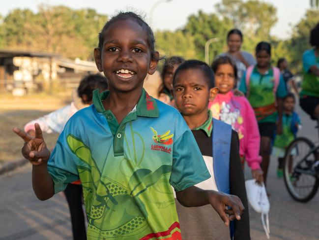 Ludmilla Primary School's attendance and engagement has increased thanks to a partnership with the Bagot Community walking school bus program. Picture: Pema Tamang Pakhrin