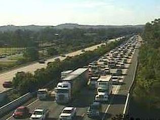 M1 chaos after truck loses gravel load