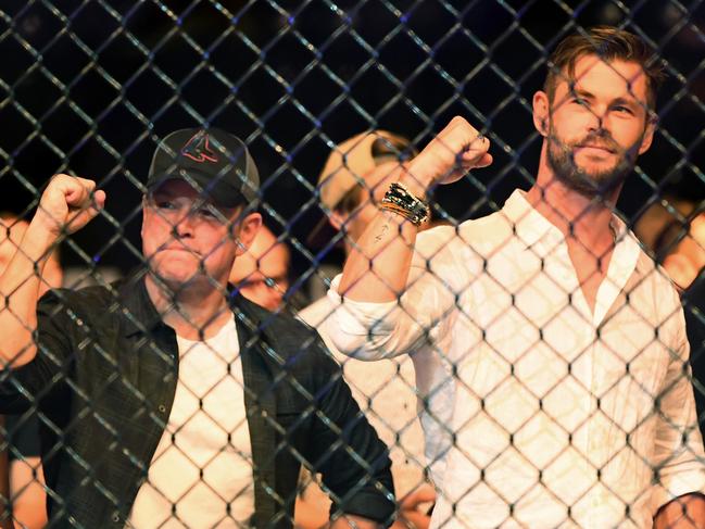 Matt Damon and Chris Hemsworth pictured ringside during the UFC234 in Melbourne in 2019. Picture: Quinn Rooney/Getty Images