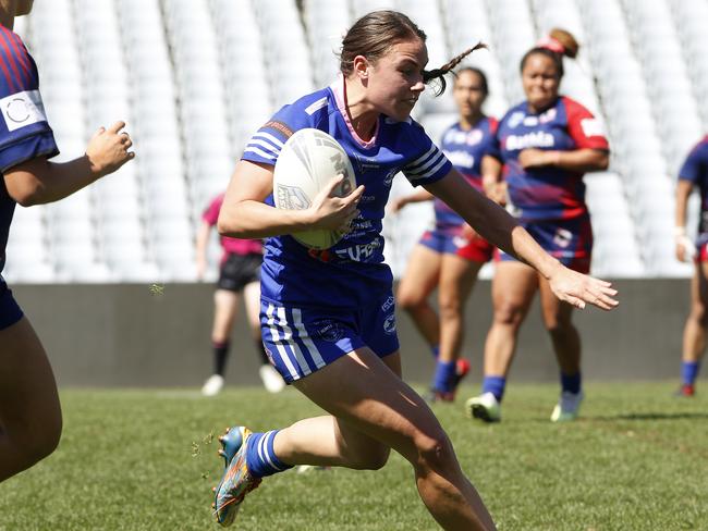 Narellan's Georgia Nies with the ball. Picture: John Appleyard