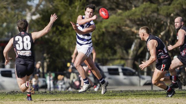 MPNFL: Nathan McKenzie fires off a handball for Pearcedale. Picture: Valeriu Campan