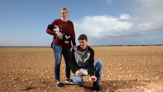 Gabrielle and Jarryn Priess, with baby Bodhi, on their Arno Bay farm. Picture: Robert Lang