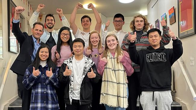 Reservoir High School VCE top scorers: Patrick Brown 90, Riki Mucollari 91, Phuc Do 90, Principal Andrew McNeil, Casey Diep 96, Amelia Norton 91, Deki Kaat-Powell 95, Alissa Nguyen 96, Jackson Zheng 96, Chloe Smith (dux, pictured second from left) 96 and Oscar Chen 96.