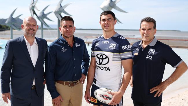 The North Queensland Cowboys have visited Cairns to launch their 30th anniversary jersey, which will be worn for the 2025 NRL season. North Queensland Cowboys chief executive Jeff Reibel, former Cowboys player Joel Riethmuller, current player Jake Clifford and 1995 season player Dean Schifilliti launch their 30 year jersey at the Cairns Esplanade lagoon. Picture: Brendan Radke