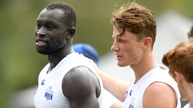 Majak Daw and Lachlan Hosie, right, during North Melbourne’s intra-club match at Arden Street. Picture: Morgan Hancock/Getty Image