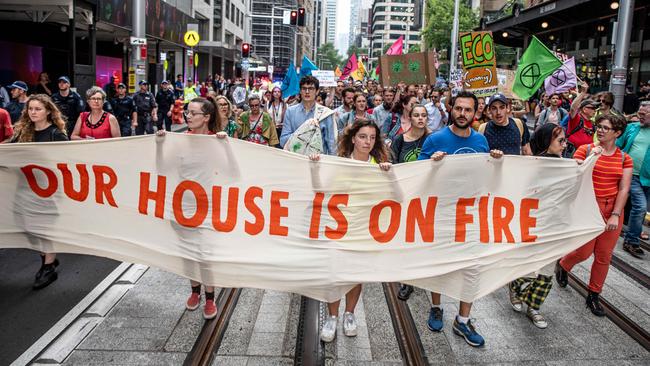 Extinction Rebellion activists protest along George St in Sydney last month. Picture: Flavio Brancaleone