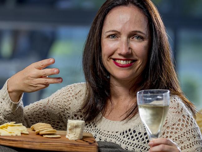 Speech pathologist Trish Hull is hosting a new fun 'wine and sign' night. Learn basic sign language while enjying wine and cheese. Trish signing "wine".   Picture: Jerad Williams