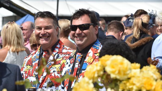 Patrons brought plenty of colour to the track. Picture: AFP