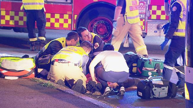 Paramedics treated the woman before she was taken to hospital with critical injuries. Picture: Daniel Shaw/SWA