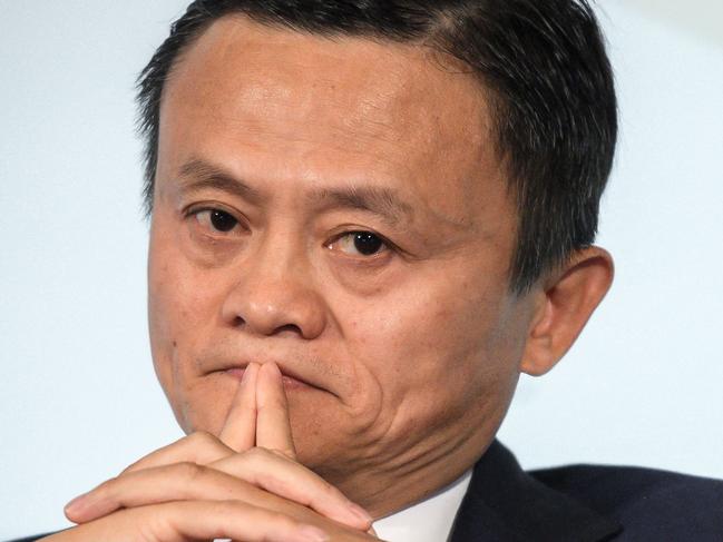 (FILES) This file photo taken on October 2, 2018 shows Alibaba Group co-founder and executive chairman Jack Ma attending the opening debate of the 2018 edition of the WTO public forum on sustainable trade, at the WTO headquarters in Geneva. - China's Ant Group said on January 7, 2023 that it would adjust its shareholding structure so that its billionaire founder Jack Ma would no longer hold control over the fintech giant. (Photo by Fabrice COFFRINI / AFP)