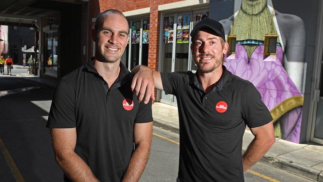 Jace Bode and Brett Ebert from the AFL Players Association pictured in Vardon Ave in Adelaide. Picture: Tom Huntley