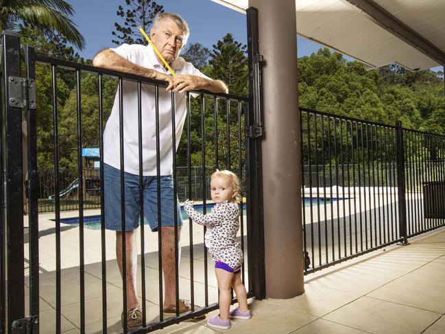 Children under five are the most at risk for backyard drownings. Former Olympic swimming coach Laurie Lawrence with Olivia. Picture: Nigel Hallett