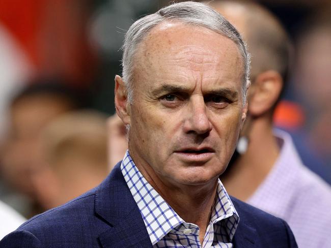 HOUSTON, TEXAS - OCTOBER 26: Major League Baseball Commissioner Rob Manfred looks on prior to Game One of the World Series between the Atlanta Braves and the Houston Astros at Minute Maid Park on October 26, 2021 in Houston, Texas.   Bob Levey/Getty Images/AFP == FOR NEWSPAPERS, INTERNET, TELCOS & TELEVISION USE ONLY ==