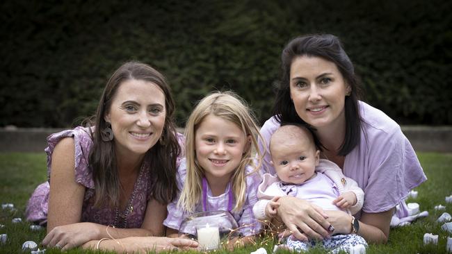 Voluntary Assisted Dying vigil at parliament Lawns. Jacqui and Natalie Gray, baby Tully and Savannah, 6. Picture: Eddie Safarik.